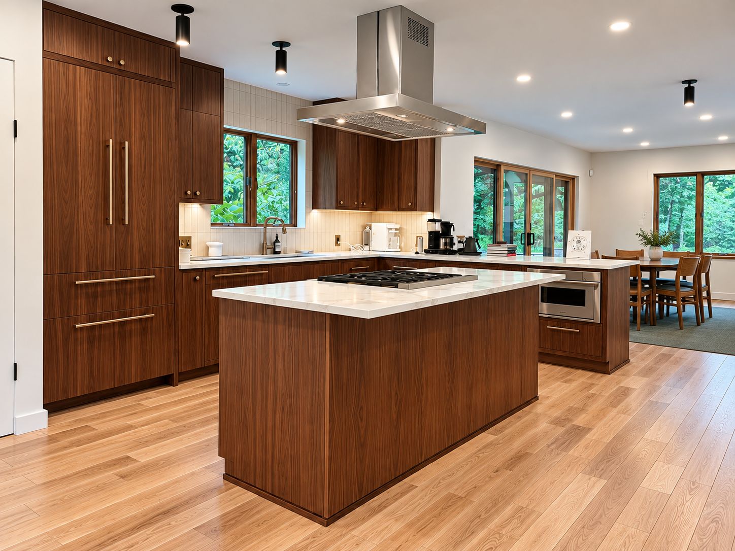 Luxury walnut kitchen in New Canaan CT featuring Mouser flush inset cabinetry, Buckskin finish and a custom kitchen island